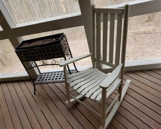 pair of these wooden rocking chairs, never out in the rain