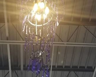 Chandelier With Plastic Spoons On It