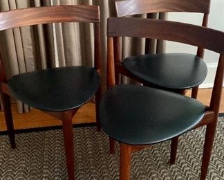 $925 (3) MCM Stackable three legged teak chairs with ebony inlay.  Hans Olsen for Frem Rojle. 28 in tall back, 16.5 in tall seat x 19 in wide x 16.25 deep 