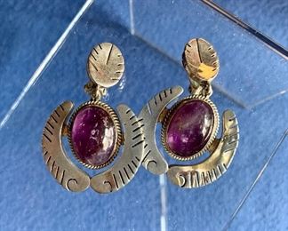 $52 Purple cabochon and sterling earrings with clip back.  Stamped "925" on reverse.   Approx 17g. 2 in long.