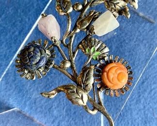 $55 Over sized Brooch, with carved stone flowers.
6 in tall x 4 in wide.