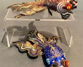 $995 Pair of silver enamel articulated large Koi fish., one sapphire, one salmon.  Each approx 7 in long.  Salmon Koi is in excellent condition.  Sapphire Koi is missing two legs.  Each stamed "SILVER" on tail. 