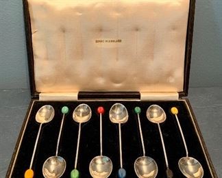 $170 Eight English demi tasse Sterling Silver spoons with celluloid handles, in box.