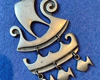 $40 MCM large pewter pendant Rune Tennesmed signed ship and fish pendant
Stamped” R.Tennesmed Sweden”
3.5in long x 2 in wide
50g
