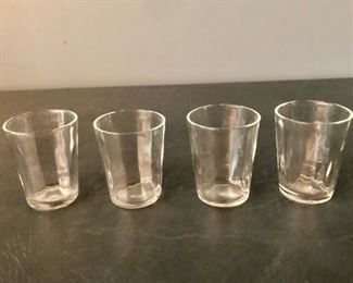 $12 Set of four glass shot glasses 2”H 1.5”D 