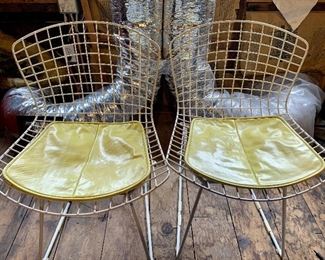 Pair. Original set of two white side chairs, with original yellow pad seats, by Harry Bertoia for Knoll, circa 1980. 