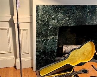 We have two vintage Holtkotter standing lamps with adjustable arms