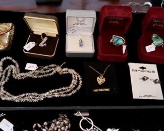 See prices on tags in photo. 