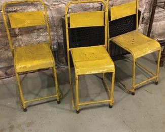 3 yellow folding chairs 