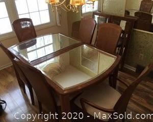 Beautiful mirror top American of Martinsville dinning table with 6 Cane back chairs. 