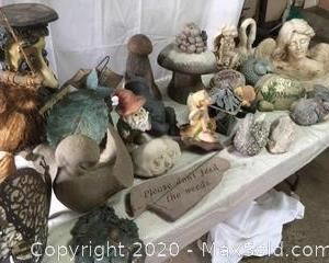 Assorted decorative garden sculptures.