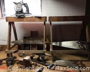 Includes an antique Best Maide no. 53 hand table grinder, Colombian vise no. 43, WEN all saw model 3700, sawhorses and an assortment of saws