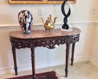 Antique Hand Carved Mahogany Table with Pink Marble Top, 46 1/2" W x 31 1/2" H x 15" D.