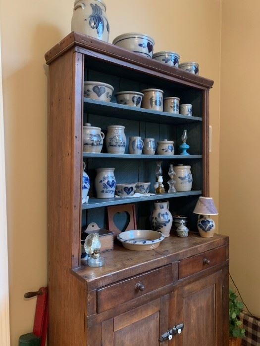 1880's cupboard  shelves in under cabinette   Rowe pottery and oil lamp collection for sale