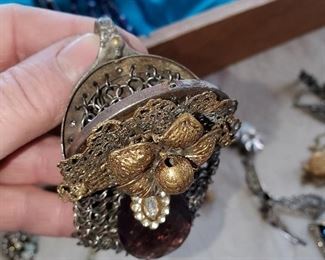 VERY UNUSUAL PIECE-THIS SALE IS JUST LOADED WITH ODD THINGS LIKE THIS! IT IS AN ACTUAL MESH COIN PURSE NECKLACE!
