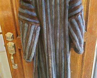 DYED BLUE MINK WITH LEATHER AND IS TOTALLY REVERSIBLE! We have never seen anything like this!