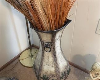 . . . a nice metal vase with dried flowers