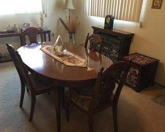. . . this is a more formal dining set -- high quality -- with four chairs
