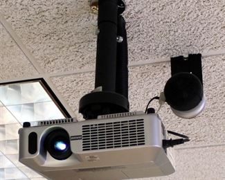 Dukane Portable LCD Projector, Model 8755E, Mounted To Ceiling, Includes Remote And User Manual