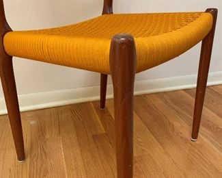 MCM Teak J.L. MOLLER Models 8 Chair Set with Original Woven Seats and MOGENS KOLD Teak Dining Room Table with Two Leaves