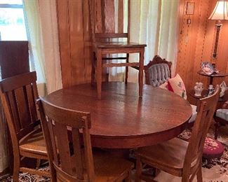 Antique Oak table with 2 leaves and 6 chairs $450