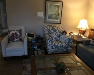 Two Upholstered Lounge Chairs, Oak End Table (matches coffee table), Lamp, Framed Art.