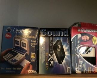 Lifestream Cholesterol Monitor, Creative Sound Blaster X-Fi Surround 5.1, Diamond One-Touch VHS to DVD Digital File Converter.