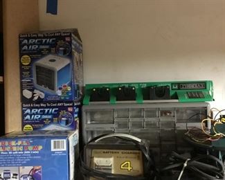 Artic Air Portable Air Conditioner,Intex Quick Fill Electric Pump, Battery Charger, Nuts and Bolts Storage Case.Everbilt Wall mount broom holder.