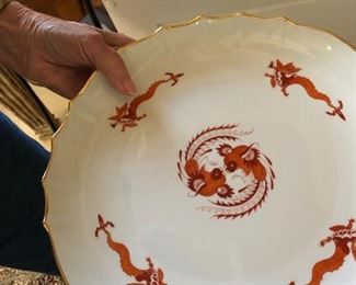 Porcelain plate with scalloped and gilded rim. The Meissen "Red Dragon" pattern Manufacturer's mark of two blue crossed swords, impressed with the numerals "139" and "C" and "b"