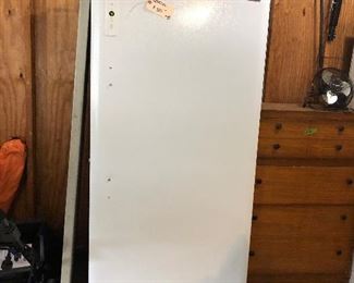 Freezer Kenmore (table leaning against freezer) Freezer runs as it should