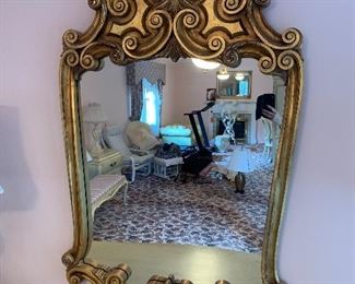 Gold painted ornate mirror in good condition.  Dimensions 54" x 34"w.  Price $150