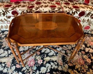 Tray top coffee table in great condition.  Dimensions 2'6"l x 21.5"w x 20.5" h.  Price $350