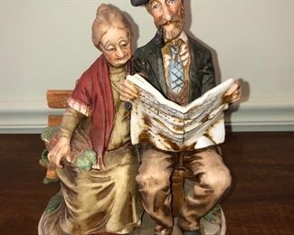 Capodimonte couple reading paper - $150
