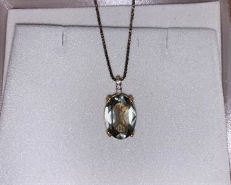 Gold plated silver and quartz stone pendant $50