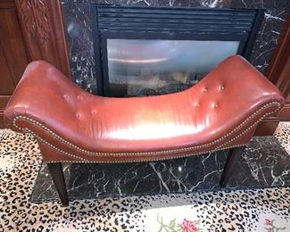 Leather saddle bench in great condition.  Dimensions 41"long x 15"deep x 24"h  Price $450