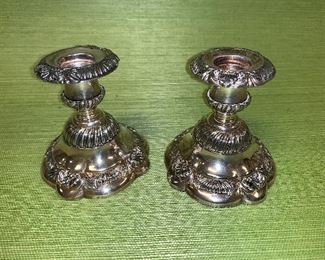 Pair of 4.5" silver-plated candlesticks in good condition.  Price $30