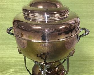 Very large silver-plated hot water/coffee urn in good condition. Dimensions 22"x16"   Price $75 
