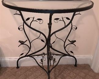 Metal frame with glass top half moon table in great condition.  Dimensions 14"d x 30"w x 30"h  Price $75