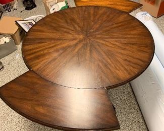Extends to 75” round table - total of 6 extensions
