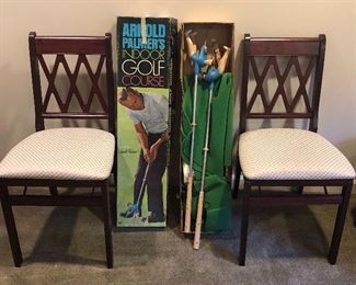 NOW $35 pair of Stakmore wooden folding chairs; vintage Arnold Palmer “Indoor Golf Course” NOW $20