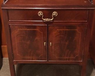 NOW $85 Baker mahogany cabinet with drawer at top & 2 doors below  (22”W, 16”D, 28”H) Would make a great nightstand or bedside table. We also have cut gray stone slab that fits on top for $10 more.