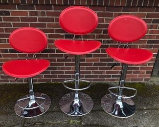 NOW $80/set (individual prices below) 3 adjustable height bar stools, red vinyl with chrome base. Seat height adjusts from 22”- 31” high. Left & center stool are NOW $32 each, right one is NOW $20 due to small white paint smear on back & scratch + nicks on seat. Bases are 18” across 