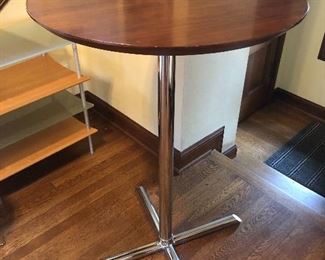 TALL walnut top bistro table. 39” tall, top is 26” across. (taller than regular table height) Needs a pad on 2 feet to prevent wobbling. Looks great with the red stools.