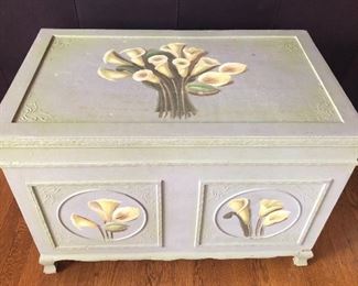 NOW $32 - Newer painted trunk (or chest) with calla lilies. Lid hinges at back. 28”L, 16.5”D, 19.5”H. Interior is flocked. Right front leg has been repaired (still sturdy)
