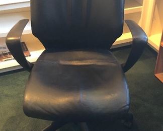 $135 - Working at home? Keilhauer black leather adjustable office chair on wheels. Model Tom 9666. 26”W, 25”D, 39”H at back. In GOOD condition. From non-smoking home. Light wear on one arm. Call or text for more pics.