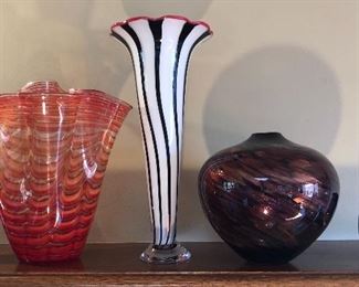 Wavy 12” orange vase NOW $25 (no signature) - all other pieces are SOLD! Signed Michelle Kaptur iridescent 8” vase, black & white vase, blue Glassy Baby