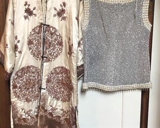 NOW $25 Chinese satin robe with metallic embroidery & quilted interior (41” long from top of collar to bottom edge, 22” underarm to underarm. Has stain on front); NOW $18 Vintage beaded sleeveless top by ”Karlos of Manila”. It’s sheer (see-thru) & quite heavy due to amount of beading. Snaps up the back, 20” underarm to underarm, 23” long. Beading is in good condition with a couple of loose beads. From non-smoking home.