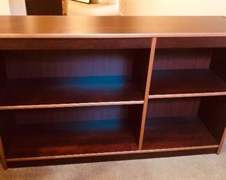 One of 2 identical bookshelves, veneer over particleboard. Made in Denmark, each 48.5”L, 12”D, 30” H.  Middle shelves are adjustable. 