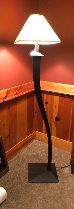 NOW $35 - Curved 1990s black metal floor lamp 65” tall. Slightly textured matte black metal, 3-way switch, 13” square base.