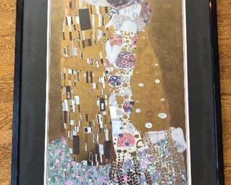 NOW $25 Framed & matted poster of “The Kiss” by Klimt, framed size 30” x 42”. Some discoloration (moisture?) on black mat under glass.